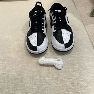 Women’s black and white Air Jordan 1SE